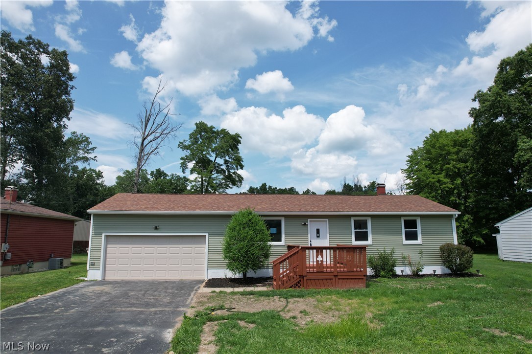 Extensively renovated and just a few blocks from Craig Beach. Engineered hardwood runs throughout the main level. The kitchen is new top to bottom; granite counters, cabinetry, and stainless appliances. The full bath was redone with a new tile surround. The finished basement has luxury vinyl plank flooring, an additional 1/2 bath, and a new egress window.  This space could be a third bedroom, office, or den. Exterior updates include new vinyl siding, vinyl windows, entry doors, and downspouts; low maintenance for years. Relax out back in your pool with a 12' x 24' deck and a freshly poured concrete patio, ready for entertaining. Turnkey and walkable to the lake. Lake Milton, Ohio’s 72nd State Park. Amphitheater, beach, swimming, fishing, boating, walking and jogging trails plus golf, restaurants, wineries and shopping.