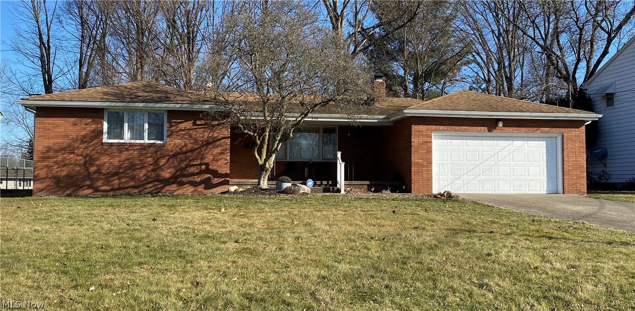 Brick ranch home. Hardwood floors throughout home.  Large living room with wood burning fireplace, Dining Room, Spacious Master Bedroom with Bathroom, two additional bedrooms.  Finished basement with wood burning fireplace.  Pool table stays. There is an attached breezeway.  Two car garage. Shed. Seller providing one year home warranty.