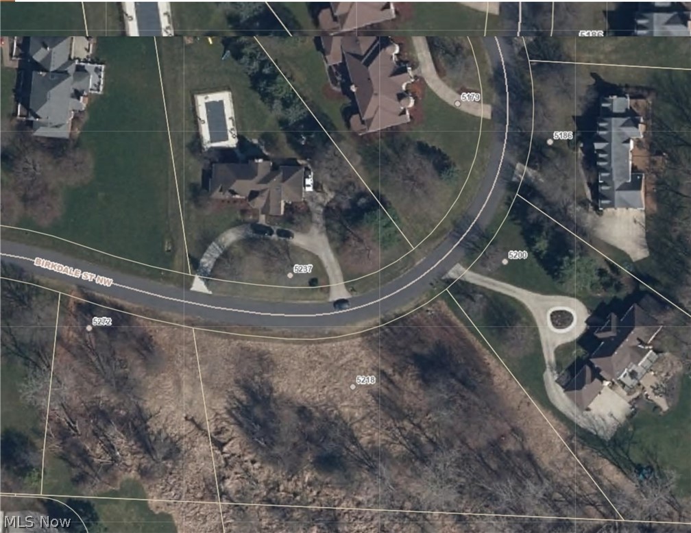 One in a million dream homesite adjacent to Brookside Country Club, surrounded by beautiful homes and quality neighbors in the Jackson Township school district!  What's more is that this pie-shaped, wide property provides a lot of privacy with its 257 feet of frontage and even wider along the back.  The land has undergone a formal soil-boring test by Wertz Geotech Engineering, which confirmed a house with a basement can be built on the northeast part of the property.  The rest of this 1.3-acre lot offers a wonderful landscape design opportunity.  The lot has access to city sewer via the closest manhole northeast of the property.  The current owner completed comprehensive due diligence necessary to build a home but decided to leave Ohio.