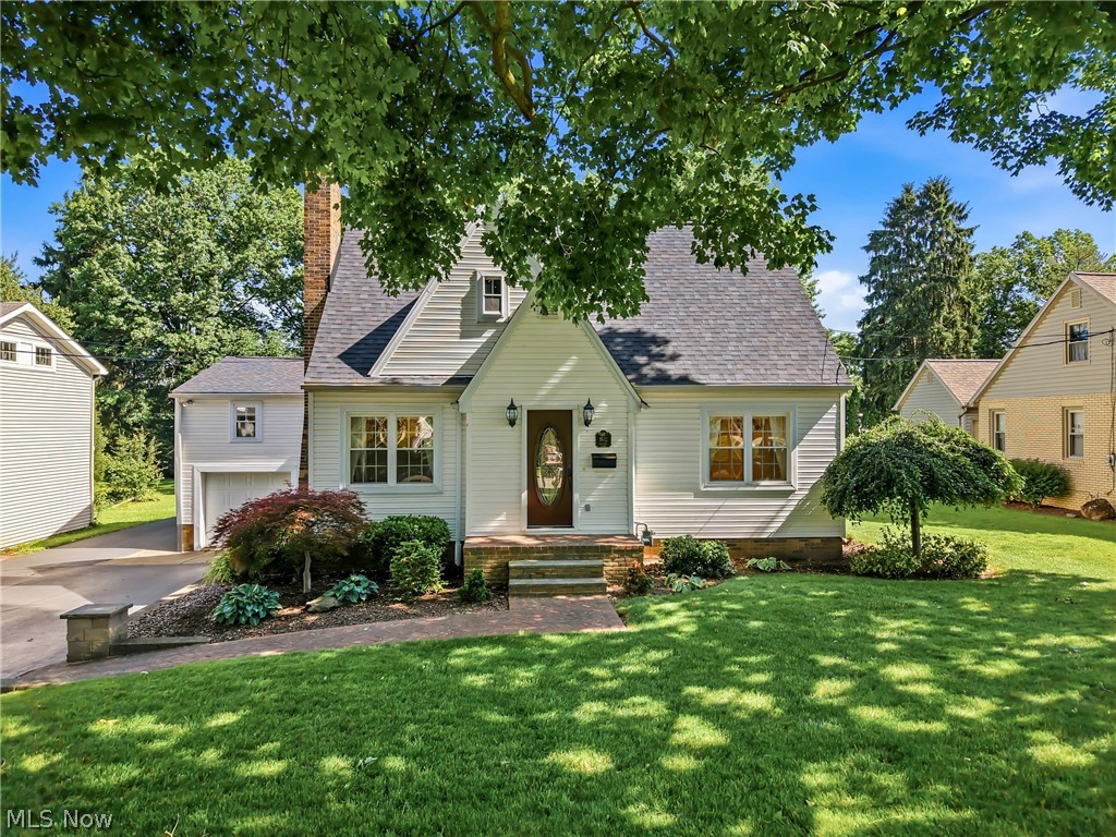 The perfect place to call home in this well-loved Cape Cod that has only had two owners. Many improvements have been made with a large addition in 1997 which included 2x6 walls with eat-in kitchen and envious walk-in pantry! Sunken family room and 3-season enclosed porch walks out to a 3-tiered wood deck. Original part of home has refinished hardwood floors with a combined dining and living room area. 1st floor bedroom and updated half bath. 2nd floor has 2 bedrooms and updated full bath. Ample closets. Vinyl windows throughout. Newly shingled roof. Vinyl siding. New brick/cement sidewalk and front porch (2019). New gas furnace and A/C (2020). Kinetico water system and softener (2023). Beautiful front and back yard with storage shed and plenty of storage above garage and enclosed porch. Close by to junior/senior high school, community center, parks, restaurants, and all that smaller town living has to offer.