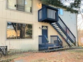 Investment opportunity in Stow.  Up down duplex, convenient location close to everything. Private lot, 4 car attached garage, perfect for storage. Each 2 BR, 1 bath unit, has its own in unit laundry room.  Each unit has a balcony as well and 2 garage bays for storage.  Downstairs unit was updated in 2019.