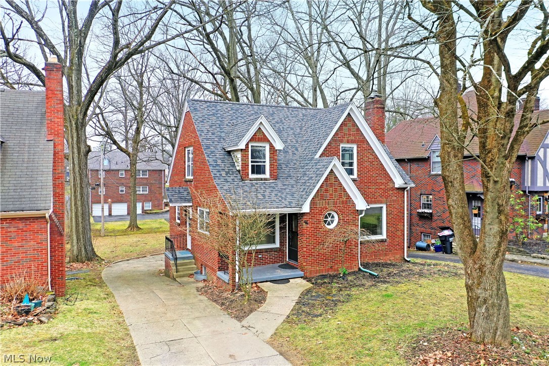 This all brick, 3 bedroom, 2.5 bath home is ready for you! Welcome to 94 Jennette Dr in Newport Glen Historic District! The winding streets of this charming neighborhood lend a feeling of days gone by and make an ideal location for your new home! Step inside and take notice of the redone, original hardwood flooring that flows throughout the home. The living room is perfectly sized for cozy evenings on the couch in front of the fireplace. The formal dining room is just across the entryway and is the perfect spot for fancy dinners or casual bites to eat. Steps away you find the kitchen with updated appliances and tons of cabinet space. A large main floor bedroom and an update powder bath complete the first floor. Upstairs plays host to two additional bedrooms, each with double closets, and an updated full bath! The lower level of this home includes a spacious family room area, laundry services, another full bath and a built in 2 car garage! What are you waiting for? Call today for your personal tour! **Updates: Roof 2024, AC added 2022, Basement LVT 2024, Hardwood Floors Refinished 2022, Upstairs Bath Updated 2022, Half Bath Updated 2022.**