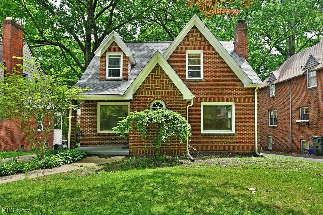 This all brick, 3 bedroom, 2.5 bath home is ready for you! Welcome to 94 Jennette Dr in Newport Glen Historic District! The winding streets of this charming neighborhood lend a feeling of days gone by and make an ideal location for your new home! Step inside and take notice of the redone, original hardwood flooring that flows throughout the home. The living room is perfectly sized for cozy evenings on the couch in front of the fireplace. The formal dining room is just across the entryway and is the perfect spot for fancy dinners or casual bites to eat. Steps away you find the kitchen with updated appliances and tons of cabinet space. A large main floor bedroom and an update powder bath complete the first floor. Upstairs plays host to two additional bedrooms, each with double closets, and an updated full bath! The lower level of this home includes a spacious family room area, laundry services, another full bath and a built in 2 car garage! What are you waiting for? Call today for your personal tour! **Updates: Roof 2024, AC added 2022, Basement LVT 2024, Hardwood Floors Refinished 2022, Upstairs Bath Updated 2022, Half Bath Updated 2022.**