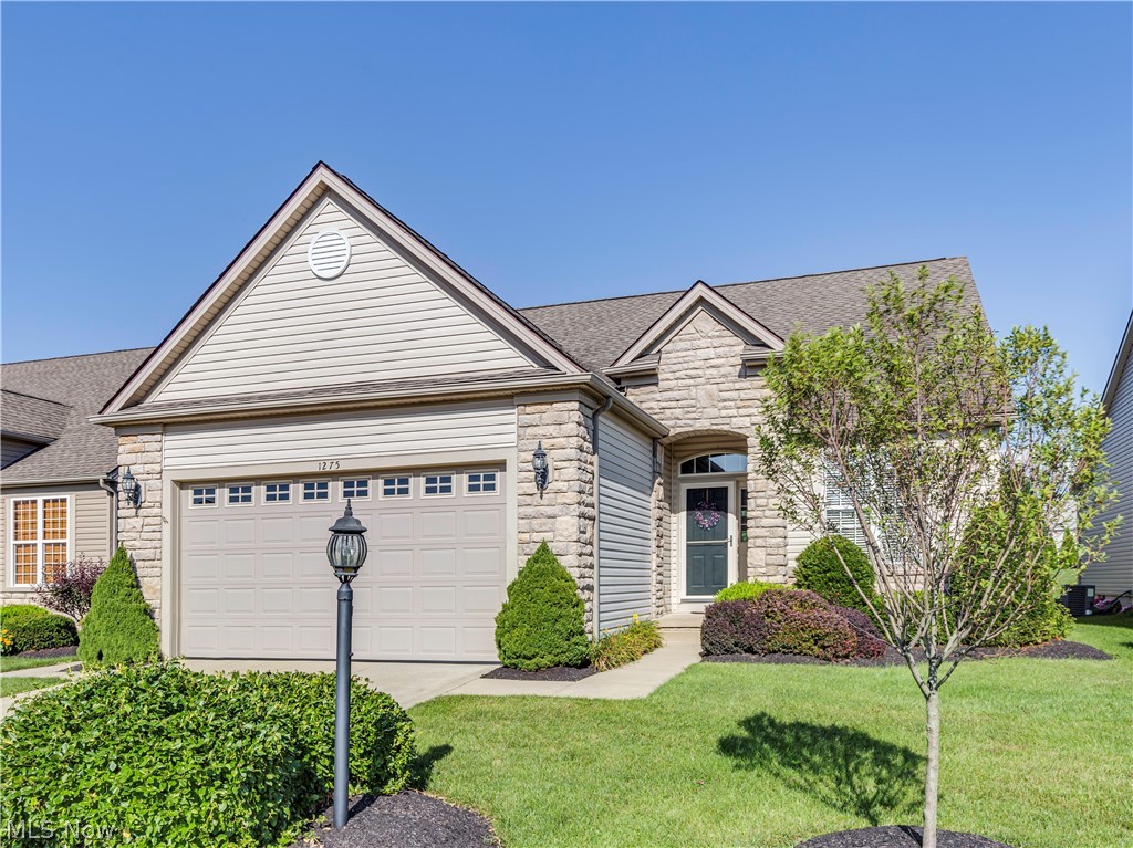 Welcome to this freestanding, maintenance-free living, cluster home in Wheaton Place at Creekstone. The immaculately maintained former model home is only minutes from Fairlawn/Montrose. This open concept unit has many upgrades including a first floor master with custom closet and glamour bath. The large kitchen opens to the vaulted Great Room with wall of windows and gas fireplace. The kitchen has maple floors, granite counters and an eat-in peninsula. Professionally finished lower level includes family/media room, office half bath and rec room with spectacular bar & pool table. Enjoy the expanded patio with Sunsetter retractable awning in a very private backyard w/privacy fence on 2 sides. Built-in Bose speakers thoughout the home and patio.