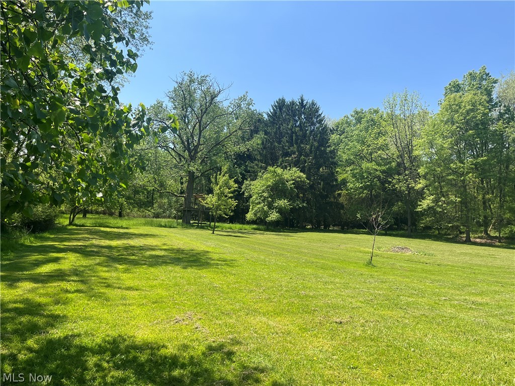 Welcome to a rare opportunity to own a retreat on over 4 beautifully diverse acres. This stunning property offers the ideal canvas to nestle your home in an area to give you both privacy and flexibility. Picture your home nestled among the trees with room to spare for a garden, barn, or workshop. The wooded area offers shade and seclusion, while the open land provides sunlit space for recreation, pasture, or expansive views. This lot is perfect for a home with a walk out basement. Located in the corner of the township, this lot offers convenient access while maintaining a sense of peaceful seclusion. It’s a rare combination of natural beauty and strategic positioning.