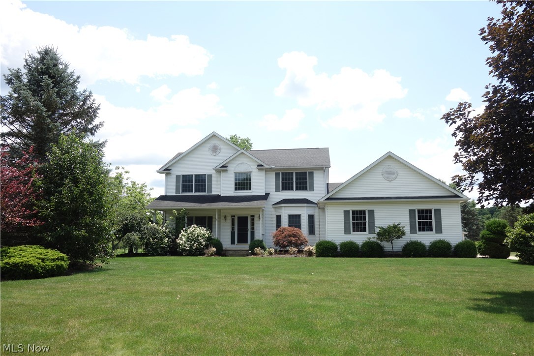 "YES"...A custom built one-owner home plus garage space for 6 vehicles on a beautifully landscaped .9 Acre lot "Everything You've Ever Wished For" right here**This contemporary home w/an inviting foyer offers rich hardwood flooring, a 1st floor laundry, 2.5 bathrooms, 3 possible 4 bedrooms w/ plentiful closets, A superb 1st floor office that could be a 4th bedroom **A fabulous kitchen w/multiple cabinetry, lots of counter space, an island, a pantry and a huge eating area that flows into a jumbo great room w/ gas fireplace, plus a lovely sun room w/walls of windows, sky lights & sliders to a huge composite deck overlooking the magnificent back yard** A Vaulted Master Suite w/ primo master bathroom: double sinks--large tub--separate shower & walk-in closet** A full unfinished basement superbly ready for your lifestyle and ideas** Furnace approx. 2 years old & new well in 2013**A generous amount of concrete driveway w/a 2 car attached 26 X 24 heated garage **Bonus:  a 24 X 40 detached gar