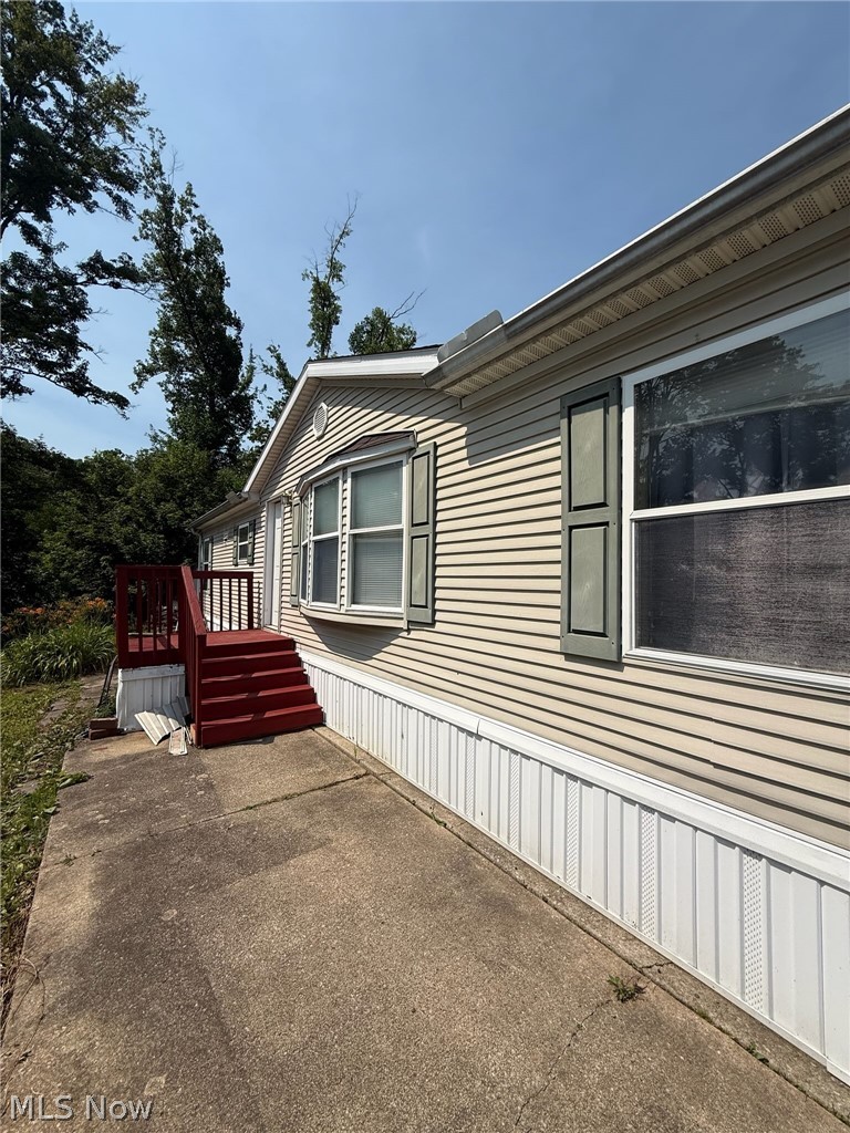 Welcome home to this 2000 manufactured home. This home features 3 bedrooms, 2 full baths an eat in kitchen and a wood burner fireplace to get cozy by in the wintertime. The rooms are sized for comfort and this home just needs some TCL to make it your own style. This home is priced to sell and the seller is extremely motivated. The owner has never used the furnace since they have bought the home and just have used the the wood-stove and electric heaters for a heat source. All parties must apply to the park for approval and check with pet allowances and restrictions. Lot rent is 500.00 which include water, sewer and trash. The seller is selling as-is condition.