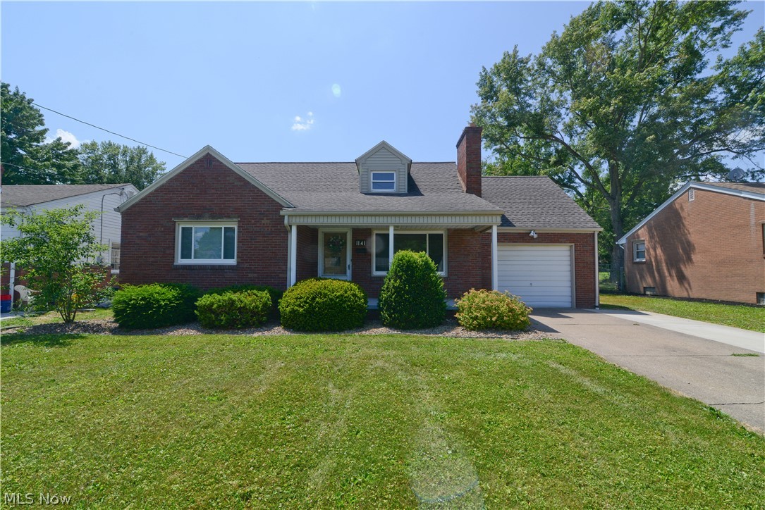 Welcome to this immaculate home! Pride of ownership in the care and maintenance of this property inside and out! Fresh landscape with easy care river stone enhances the curb appeal.  Pull onto concrete drive with an added extra parking space. Walk across the covered front porch with room for furniture. Enter the front door to the spacious Living Room that has year-round natural light from the large front window. Do you enjoy a fireplace? This home boasts two! Living room flows into the large Eat in Kitchen, all appliances stay. Two good sized first floor bedrooms. Upstairs offers a 12x32 room to use as you choose. The basement is finished, and has a second fireplace, a decorative brick wall and long bulit in bar.  A second full bathroom in basement. Plenty of room for gatherings and celebrations. Newer roof and windows.  Furnace, Central Air, Hot Water Tank all new-2018 & serviced annually. Carpets, Windows, Gutters, and Drains all freshly cleaned & serviced for new owners.  Patio off