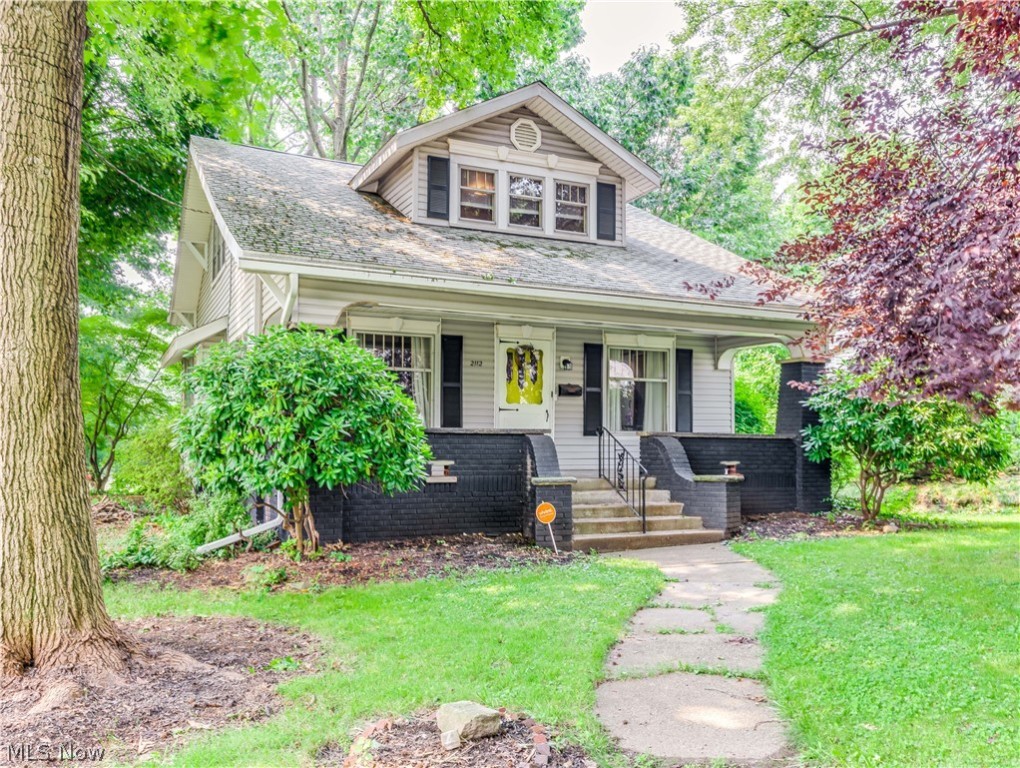 Welcome to 2112 Washington Blvd. NW This beautiful 4 bedroom home sits on a private wooded lot and has a large front porch for you to enjoy. As you enter the home you are greeted by hardwood floors and a fireplace in the great room. Excellent option for a first floor bedroom, with the remaining three bedrooms on the second level. The kitchen has a separate eating area, along with a formal dining room. You'll love the spacious closets in the bedrooms, and the modern updates that have been made throughout. 
Call today to schedule your private tour of this charming home!