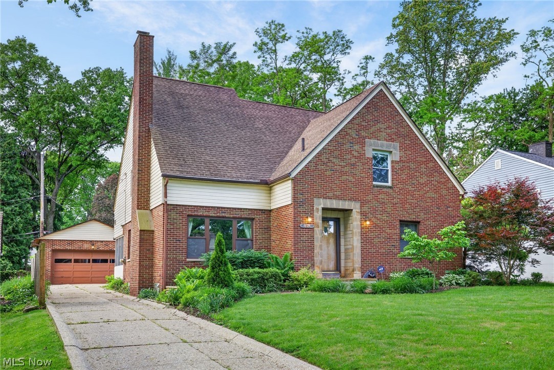 Winner of the 2025 Beautification Award, 674 Upper Merriman Dr in Akron is a beautifully maintained home filled with warmth, charm, & thoughtful updates throughout. Offering 3 bedrooms, 2.5 bathrooms, & a 2-car garage across a flexible & functional layout, this home blends classic character with everyday comfort in a highly desirable setting. The living room welcomes you upon entry with rich hardwood flooring, a cozy fireplace, & a stunning mantle that immediately creates a warm & inviting atmosphere. Just beyond, the formal dining room flows seamlessly into the spacious eat-in kitchen, creating an easy layout for both entertaining & daily living. The kitchen offers abundant cabinetry, generous amounts of Corian counter space, stainless steel appliances, & a casual dining nook. The 1st floor also features an office, convenient laundry room, & a heated enclosed porch that adds functionality for everyday living. The 1st floor bedroom is spacious & versatile, accompanied by a nearby full bathroom that creates added privacy & flexibility for guests or convenient 1st floor living. Upstairs, the primary suite feels like a retreat of its own with a generously sized walk in closet & direct access to the bathroom featuring a separate standup shower & large soaking tub. The additional upstairs bedroom is also spacious with access to the full bathroom through the hallway. The basement expands the home even further with a half bathroom & an abundance of open space perfect for future recreation areas, a home theater, or gym. Outside, enjoy the private fenced yard & patio area, perfect for family gatherings. Additional updates include professionally refinished hardwood floors(2026), remodeled bathrooms & kitchen(2014), Anderson windows(2015), chimney relined and tuck-pointed(2022), gutter guards(2023), a rebuilt back porch(2015), and many more. A home filled with character, comfort, & timeless appeal — thoughtfully designed for everyday living & memorable gatherings alike.