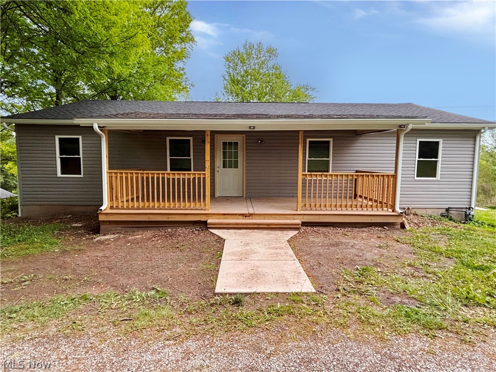 Newly remodeled 3-bedroom, 2 full bath ranch home situated on 1.89 acres in a desirable semi-rural setting, just minutes from all amenities. Extensive recent updates include a new roof, gutters, soffit, fascia, downspouts, siding, windows, rear deck, front porch, flooring throughout, kitchen cabinets with granite countertops, front and basement doors, and French doors from the dining room leading to the new deck. Both bathrooms have been completely renovated, and the home also features updated electrical service and new lighting throughout. Buyer-friendly neutral paint colors and flooring create a fresh, move-in ready interior. The large basement has been fully gutted and offers abundant storage or the opportunity to finish additional living space, with plumbing already in place for an additional bathroom. Ready for immediate occupancy.