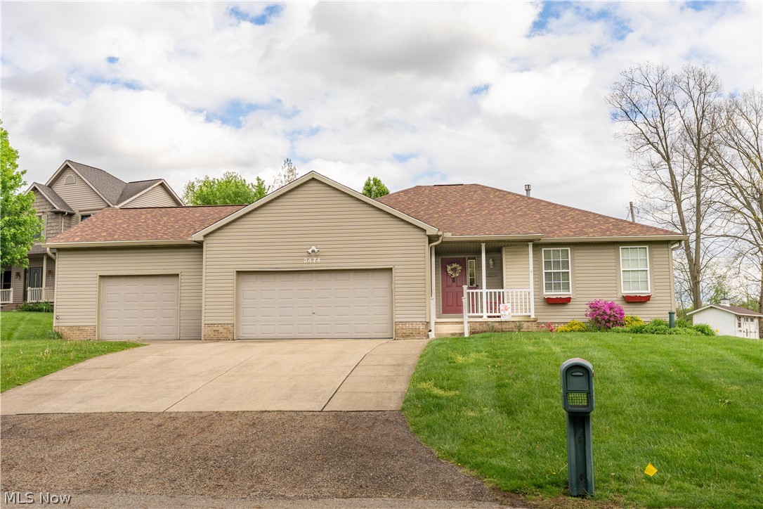 Welcome to this beautifully maintained, one-owner ranch in Plain Township, built in 2004 by Schalmo Homes. Ideally situated on a spacious half-acre lot in a quiet, established neighborhood, this home is located within the highly desirable Plain Local School District.
From the inviting front porch to the thoughtfully designed layout, this home offers comfort, quality, and privacy throughout.
Step inside to an open-concept great room featuring a spacious kitchen with a wraparound bar/counter and sink that seamlessly overlooks the dining area and bright living room—complete with large windows showcasing the peaceful, private backyard. The generously sized primary bedroom includes a full en-suite bath with walk-in closet, while a conveniently located laundry/mudroom just outside the suite includes a utility sink and direct access to the garage.
On the opposite side of the home, you’ll find two additional bedrooms—one with a walk-in closet—and a second full bath with ample counter space. The full basement offers endless potential, with a large open area and dedicated workbench space ready for your finishing touches.
Car enthusiasts, hobbyists, or those needing extra storage will love the unique dual-garage setup—a 2-car attached garage with a stunning Nature Stone floor, plus an additional 1.5-car attached garage with high ceilings and private backyard access—perfect for a workshop, lawn equipment, or recreational toys.
Outdoor living shines with a covered back porch featuring a porch swing, leading to a beautifully landscaped backyard oasis. Step down onto a stone patio and pathway leading back to a decorative border fence with a gate opening to a wooded backdrop—creating your own private nature preserve.
Major updates include a brand new roof and 5” gutters (December 2025).
Don't miss out on this perfect blend of quality construction, functional design, and serene outdoor living—Oh... and that fantastic garage space! Schedule your private showing today!