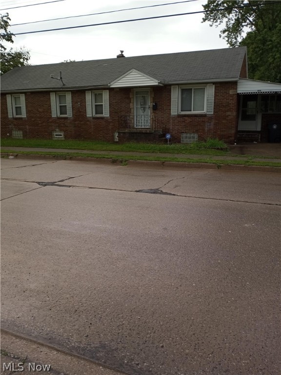 Brick ranch with three large bedrooms.  Living room and all bedrooms have hard wood floors.  Extra-large, eat-in kitchen with lots of cupboards and stove and refrigerator.  All windows and exterior doors replaced approximately 7 years ago.  Hot water tank replaced approximately 3 years ago.  There is an enclosed breezeway between the house and garage.  The 2-car garage opener and door was replaced approximately  2 years ago.