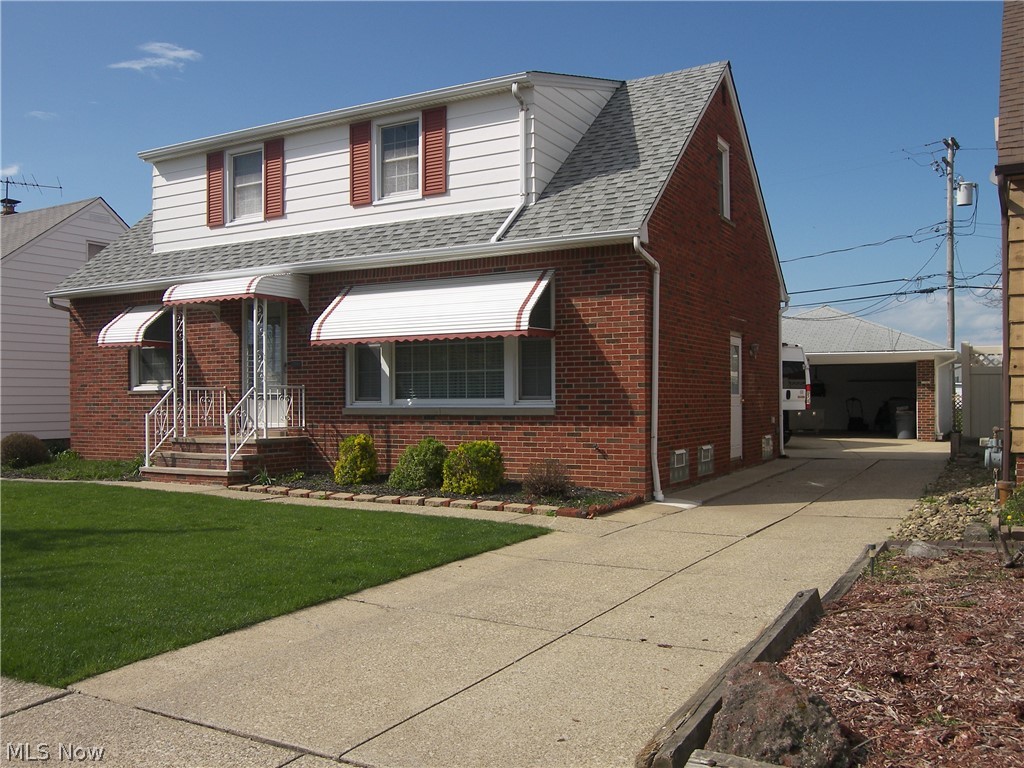 Here is a custom built 1965 1 owner brick bungalow awaiting its next chapter * Features include spacious family room w/ cozy woodburning fireplace, 2.5 baths, lower level 2nd kitchen for expanded entertaining & 2nd floor has 2 bedrooms (tandem) w/ a possible 3rd one * Appliances stay * Large hutches in kitchen & family room offer storage & display accommodation * Fresh interior paint includes basement & garage too * In addition to bsmnt. recreation rm. there are 4 other rooms for your various needs * Window updates along w/ vented glass block * Hardwood floors * Cedar closet * New up bedroom carpet & blinds * Newer stove exhaust fan/light * Nice landscaping & patio * Oversize 2 car block garage * No thru street minimizes traffic/noise * Huge open field behind house is accessed by a gate * This home is Euclid violation free!