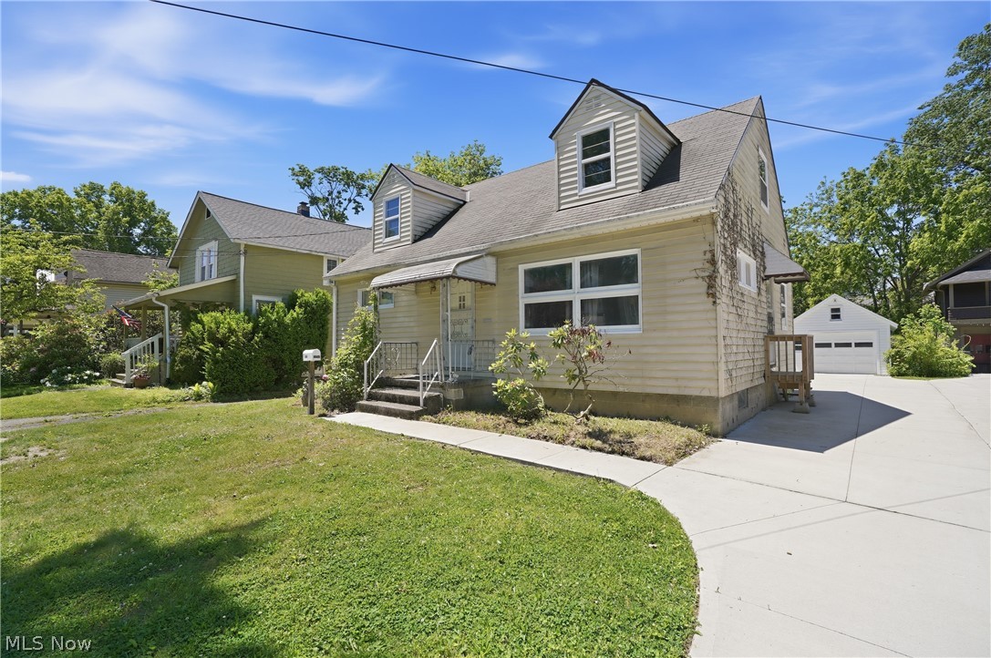 Fantastic Investment Opportunity located in the highly sought-after Cuyahoga Falls community, just down the street from the YMCA, this charming Cape Cod offers tremendous potential for homeowners and investors alike.  Step through the beautiful paneled wood front door and you'll be welcomed by hardwood floors throughout much of the main level. The floors are in solid condition and simply need refinishing to restore their original beauty. The eat-in kitchen features charming pine wainscoting and a well-designed U-shaped layout with abundant cabinet and countertop space. All appliances are included and are reported to be in good working condition.  The first floor offers two comfortable bedrooms and a full bathroom with ceramic tile and a updated shower enclosure. A fresh coat of paint will go a long way in making this home shine. Upstairs, the spacious third bedroom provides plenty of flexibility and can easily accommodate a bedroom, home office, or sitting area.  The large unfinished basement presents excellent opportunities for additional living space, storage, or a workshop. The washer and dryer will remain with the home.  Outside, you'll appreciate the newer driveway, which was completed in conjunction with the neighboring property, creating a clean and attractive appearance. A one-and-a-half-car garage and a generously sized backyard complete the package.  With just a little cosmetic updating and elbow grease, this home offers the opportunity to build equity quickly. Conveniently located near the vibrant downtown area, major highways, parks, the library, and other local amenities, this is a property you won't want to miss.