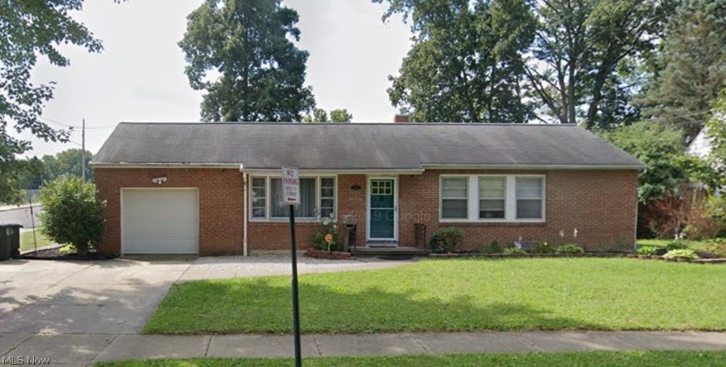 Welcome home to this beautiful brick ranch! Enjoy the updated kitchen with tall, 'soft close' cabinets and butcher block countertops. Hardwood floors throughout the main level.  3 bedrooms and 2 full baths. The basement has been partially finished as a rec room and partially laundry area and storage. Fabulous yard that is enclosed by an attractive 6ft white vinyl privacy fence. Enjoy the covered patio, along with the water feature and landscaping.