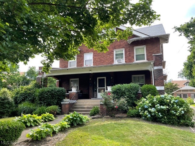 Welcome to STUNNING 30 Casterton Avenue, located in the highly desirable Highland Square.  This very well-maintained home boasts over 4000 square feet of beautiful craftsmanship.  Original hardwood floors, gorgeous coffered ceilings, built-ins, staircases and original charm can be found throughout this home built in 1908.  In this all brick, side by side, duplex you will find 4 large bedrooms and 1.5 baths on each side and several wood-burning fireplaces.   One side has been updated with charming penny tiled bathrooms and a kitchen with black and white tile to keep to its original period.  Use your own design style to put your stamp on the kitchen and bath on the other side.  This very lucrative investment property can be rented on either side or picture yourself living mortgage free while renting out just one side and living on the other.  The choice is yours.

One side is tenant occupied for $950/month + utilities. Lease valid until March 2022.