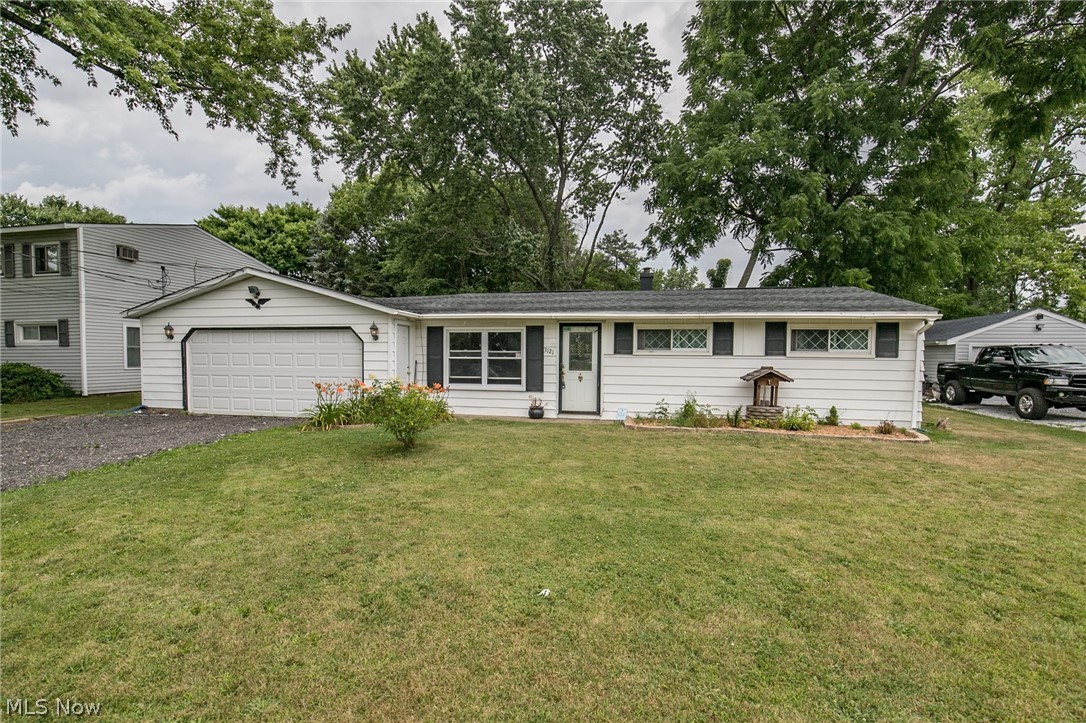 A wonderful Ranch with an open concept.  This lovely home has a large family room with a fireplace, that opens to a sun room.  The updated kitchen will include all of the appliances, and is open to the living room, which can also be used as a dining room.  The bedrooms are spacious.  There is an attached, and heated, 2 car garage, large lot, deck, and so much more.  This home is freshly painted and move in ready.