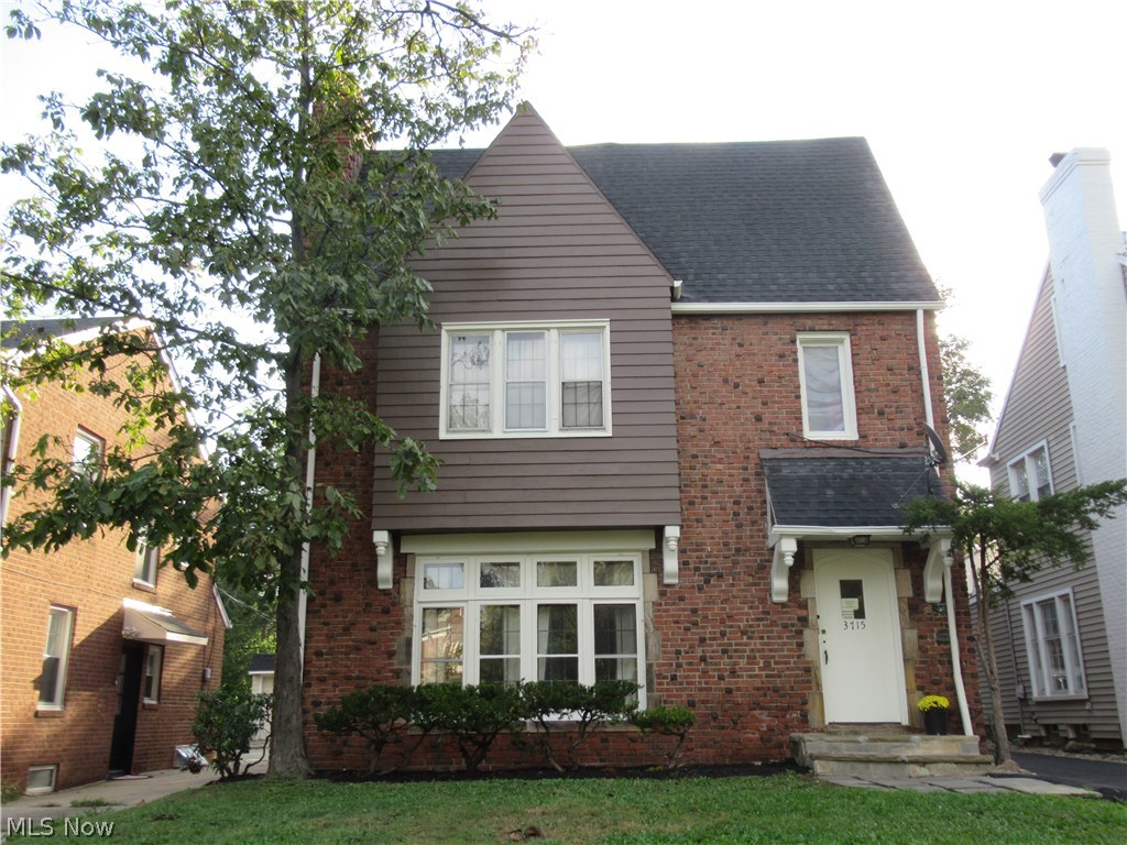 Great Shaker Heights two family home situated within the desirable lower Lomond neighborhood.  Finished 3rd floor that rents in the 2nd floor unit.  Walking distance to shopping plazas, parks, schools, and public RTA.  Just minutes away from the Van Aken district and the new downtown Shaker development.  This wonderful Tudor is violation free and fully Shaker Heights POS compliant!!  Newer driveway and garage doors, and entire exterior fully painted.  Both units offer beautiful hardwood flooring throughout and neutral colors.  Forced warm air furnaces and updated panels.  Great income producing property!!