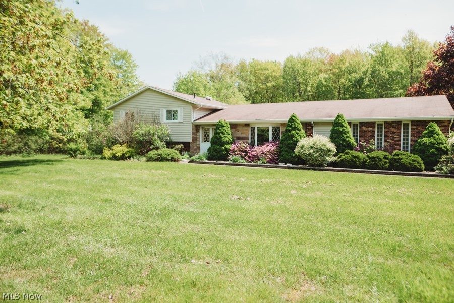 Location, location, location! 5 acres of beauty awaits the new owner of this wonderful property! If your own piece of
tranquility and nature is what you have been searching for... look no further, your search ends here! 2 ponds on the
property, one in both the front and back yard to add to the peaceful surroundings on this very quiet street. There are
also 2 outdoor mini barns for all of your outdoor necessities. Relax the spring and summer afternoons / evenings away
on the back concrete patio and shade away the sun with the remote controlled retractable awning. Inside this home,
the master suite sized bedroom has 3 closets and attached bath. The living room features a front bay window to
showcase the pond, and the lower level family room has a wood burning fireplace with blower. There is also a whole
home automatic generator. All of this and so much more, just minutes to Medina square. Schedule your private
viewing today to see all this home has to offer!