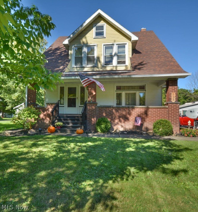 Old house people.. This one is for you! Mineral Ridge  cape cod on nearly an acre! This turn key home has so much to offer. The spacious front porch leads into a huge living room with leaded windows, amazing natural woodwork, French pocket doors and grand staircase. The formal dining room with window seat and built in china cabinet is large enough to entertain the whole family. Updated kitchen with newer floor, cabinets and neutral countertops leads out to the back porch that overlooks the huge yard. Upstairs is large bath with claw foot tub and pedestal  sink that keeps the old fashioned feel. 3 nice sized bedrooms and a walk up attic offering tons of storage. Original hardwood floors under all carpet. The basemant has  glass block windows and even more space for storage. 2 car heated garage, extra parking and Meander Fish and Game Refuge at the back of yard. Extremely well maintained, must see this one in person.