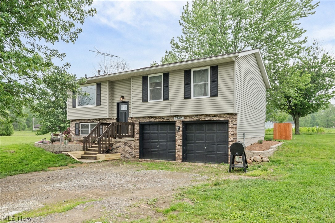 Don't miss this opportunity to own a well-maintained 3-bedroom, 1-bath home in the desirable gated community of Cinnamon Lake. Situated on nearly an acre and located directly across from the lake, this property offers the perfect combination of privacy, space, and scenic surroundings. The spacious lot provides plenty of room for outdoor activities, gardening, and entertaining. A standout feature is the 28x32 large outbuilding, ideal for a workshop, storage, recreational equipment, or hobby space. Enjoy all the amenities Cinnamon Lake has to offer, including boating, fishing, swimming, beaches, parks, and year-round community events. Whether you're looking for a full-time residence or a relaxing getaway, this property delivers the best of lake community living with room to spread out.