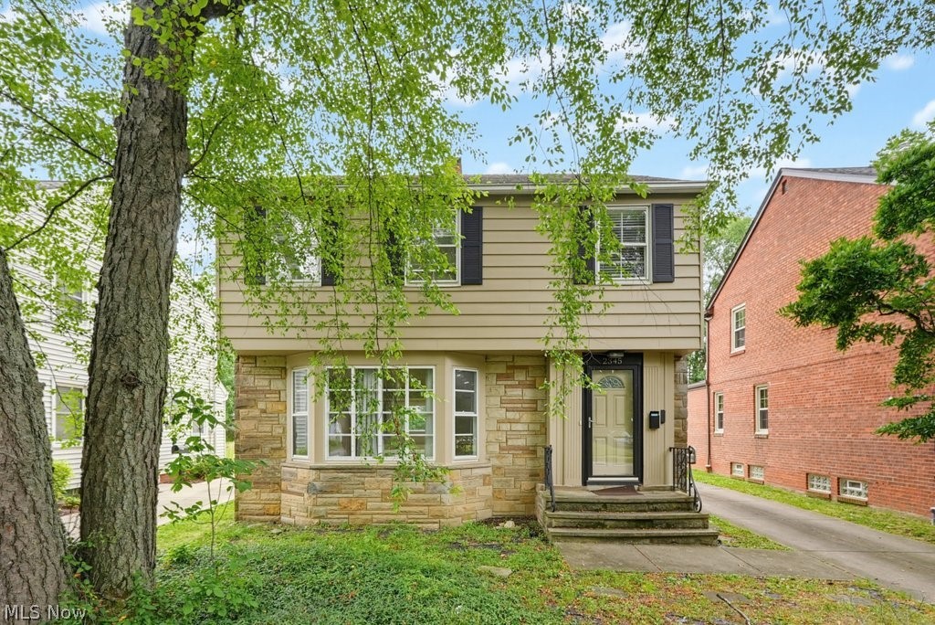 Welcome home to this charming Colonial on a desirable tree-lined street! From the inviting front entry, you'll immediately appreciate the warm and welcoming atmosphere. The first floor features an open layout with beautiful hardwood floors throughout the living and dining rooms, a spacious family room, an eat-in kitchen, and a half bath. Upstairs offers three generously sized bedrooms and a full bath complete with a separate shower and soaking tub. The finished lower level provides the perfect recreation room, media space, or man cave, along with a separate unfinished laundry and storage area. Abundant storage can be found throughout the home. Step outside to a large private deck overlooking the expansive backyard—ideal for entertaining, relaxing, or outdoor activities. Completing this wonderful property is an oversized two-car garage. Don't miss the opportunity to own this beautiful home in a fantastic neighborhood!