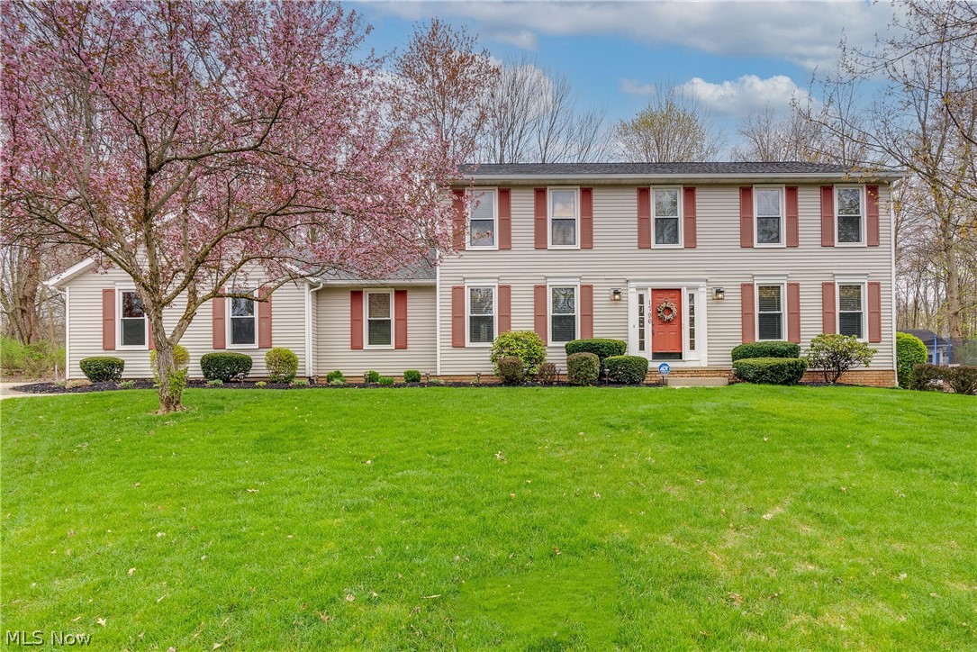 Welcome to your gorgeous 4 bedroom, 2.5 bath home in the area of Heather Hills in the heart of Stow!
You will not be disappointed when you enter the front door of this amazing and well-maintained home. To the left you will find your formal dining room and to the right you will find your formal family room. Past the foyer entrance is your extremely spacious eat-in kitchen, large enough for an additional dining table and with an open floor plan that leads into the living room and all of the natural light it provides with its oversized picture window. The eat-in area has double doors that open to the addition of the enclosed, all glass sunroom with sliding glass doors which take you to the massive composite deck, both perfect for entertaining.
The full, finished basement with its built in bar, has so many options…. space for a media/tv room, another space for an additional bedroom or office, and also, another large area for an additional living room/rec-room! The options are endless!