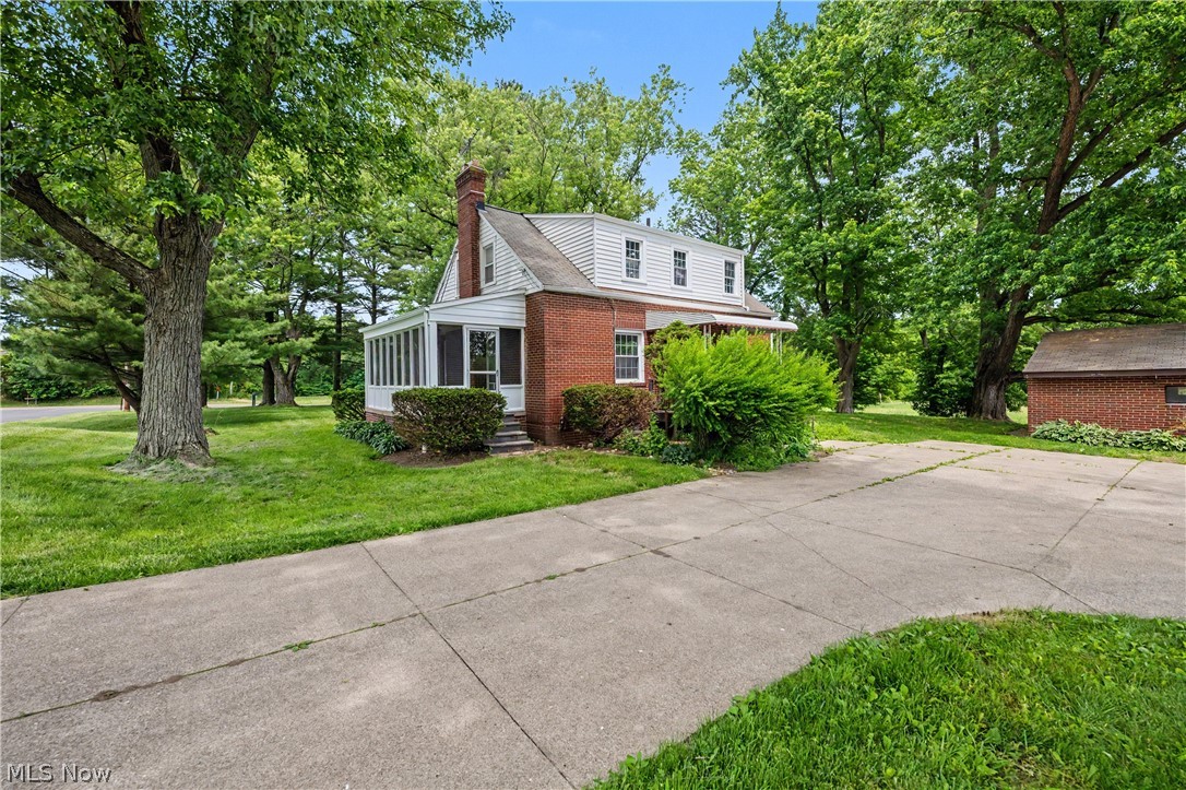 Set on two beautiful acres in New Franklin, this charming bungalow offers the perfect combination of character, comfort, and peaceful surroundings. Thoughtfully maintained and filled with warmth, the home welcomes you with timeless details and inviting living spaces designed for everyday living. Rich hardwood floors flow throughout much of the home, adding warmth and character to the bright, comfortable interiors. The updated kitchen serves as the heart of the home, featuring modern finishes, ample workspace, and a layout that makes both meal preparation and entertaining effortless. One of the home's most inviting features is the screened-in porch—a perfect spot to enjoy morning coffee, unwind with a good book, or take in the sights and sounds of the surrounding property while enjoying the outdoors in comfort. Outside, the expansive two-acre setting provides plenty of room to garden, play, entertain, or simply enjoy the privacy and tranquility of country living. With its blend of charming bungalow appeal, modern updates, and picturesque acreage, this New Franklin property offers a rare opportunity to enjoy a relaxed lifestyle in a beautiful setting.