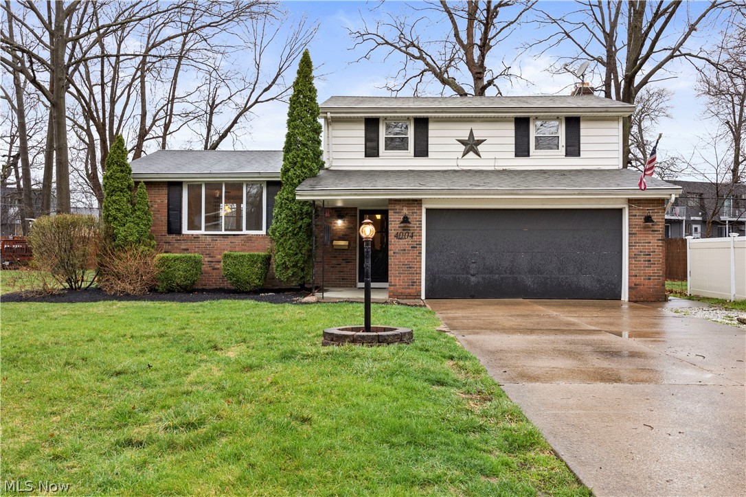 Welcome to 4004 Washington Ave in Lorain’s desirable west side! This spacious split-level home offers over 2,000 sq ft of living space with room to grow, entertain, and truly make your own. Featuring 3 bedrooms, 1.5 bathrooms, and multiple living areas, this home is perfect for today’s buyers looking for both comfort and flexibility.

Step inside to find a freshly updated interior with the entire home recently repainted, including the kitchen cabinets, giving the space a clean and modern feel. The generously sized rooms throughout provide endless possibilities for furniture layout and everyday living, while the large primary bedroom offers a relaxing retreat.

The beautifully remodeled full bathroom adds a touch of luxury, and the lower level provides even more versatility with a bonus living space—perfect for a second family room, home office, or recreation area. Brand new carpet in the basement and professionally cleaned carpets throughout make this home truly move-in ready.

Enjoy peace of mind with a pre-listing inspection already completed, with major items addressed and many minor improvements taken care of for the next owner. The home also includes key appliances such as the gas stove, refrigerator, dishwasher, and a security system.

Outside, the professionally landscaped quarter-acre lot offers a unique backyard setup with a blend of turf and natural grass, plus a cozy outdoor fireplace—ideal for relaxing or entertaining during those upcoming spring and summer nights. A 2-car garage adds convenience and storage.

Located just minutes from shopping, restaurants, schools, and Lake Erie access, this home combines space, updates, and location—making it a must-see this spring!