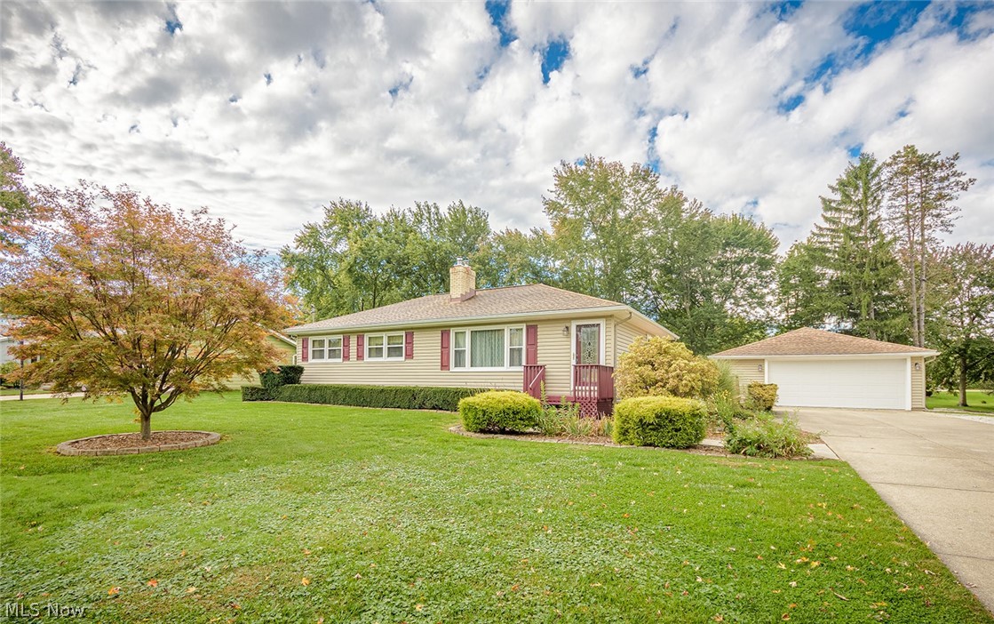 Beautiful ranch maintained in excellent condition.  Impressive curb appeal with mature landscaping and a lush green lawn and park like backyard. A double wide concrete driveway leads to a 2 car garage plus there is a deck porch , a covered patio , two sheds  and a  nice large fenced area for pets. Formal living room with wood burning fireplace and heat Insert for extra warmth. The gorgeous kitchen/dining area were recently remodeled with new white cabinets. granite counters, tile backsplash, new stainless appliances, sink, fixtures and luxury vinyl floor plus a slider to the back patio. Three bedrooms and a full bath complete the first floor.  Nice lower level rec room with a bar and a nature stone floor. a kitchenette, laundry room,  and a full bath!  Home warranty included. Close to Hudson Dr and convenient to the highway.