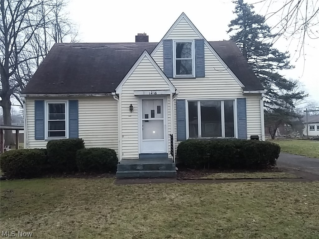 3 bedroom Cape Cod style home with 1 bedroom on first floor and 2 small bedrooms on second floor, full basement and 2 car detached garage.
