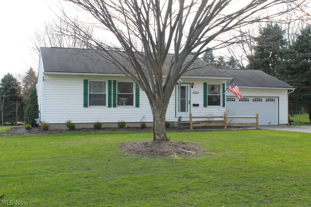 Fantastic Find in this amazingly Trendy & Tasteful ranch! Much More than meets the eye from the road with its expanded basement space (bonus guest room, family room, bathroom) that provides 400 sq. ft. of additional living space. Visit and enjoy the updated kitchen & main floor bath as well as NEW FULL bath in lower level w/ electric baseboard heat. Add to that the bonus guest room in the basement that is tasteful beyond description & nicely appointed family room and you have the makings of  Home Sweet Home ... and we haven't even talked about the other 3 bedrooms or living room! Yard has been meticulously landscaped and cared for by the current owner and a beautiful shed added. Bring your own transmitter and you already have an invisible fence, too! AND Washer/Dryer included. All of this and a one-year home warranty provided for the buyer by the seller!