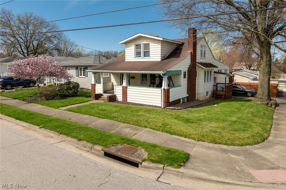 Spacious home with over 1600 square feet! Endless possibilities in this sprawling property. Beautiful woodwork and built ins throughout the first floor.  Very large eat in kitchen, 2 first floor bedrooms, full bath, first floor laundry and den that leads to a large back deck. Upstairs are 3 rooms and another full bath, perfect for a primary suite! Full unfinished basement with a 2 car attached garage plus a carport.  Fenced in back yard and a wonderful front porch to enjoy the warm evenings.  Many improvements throughout the home!  Updated windows, high efficiency furnace, updated electric.  Don't miss this one!