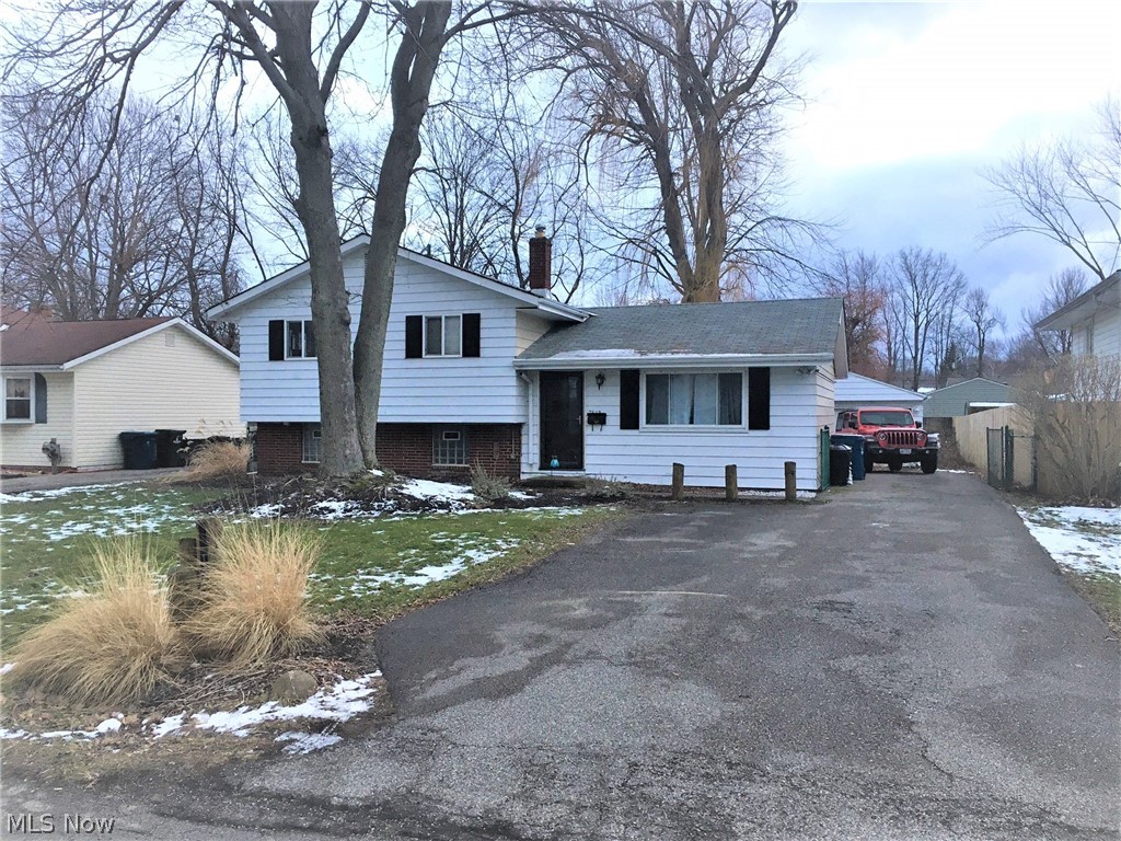 Very nice bi-level home now available in Mentor-on-the-Lake. Be close to it all! Enter the front door into the living area with nice hardwood floors. This space flows into the dining area and nicely updated kitchen. Up the stairs you will find the 3 bedrooms and a full bath with brand new subfloor and flooring (completed 1/27/21). Downstairs contains a finished lower living/rec room along with a laundry room, utility room, and a half bath. Off the rear of the home is a large deck for your summer parties. A paved driveway leads you back to the detached 2 car garage with automatic opener, the drive is doublewide in the front for additional parking. The backyard contains a nice willow tree for summer shade and the yard is fully fenced for your pets. Close to shopping, recreation, and Lake Erie, this home is ready for its new owners. Now is a great time to buy, lock in historic low interest rates with this nice MOL home.