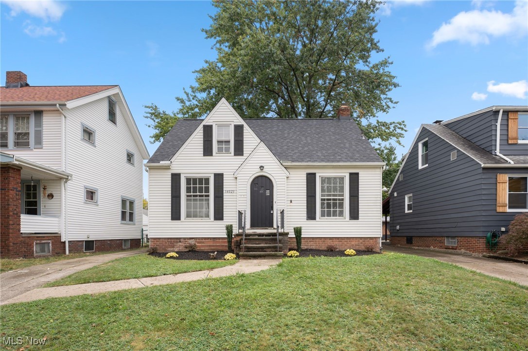 Fall in love with this beautifully renovated west park bungalow. The original hardwood floors have been refinished throughout the main floor. Completely renovated kitchen with eat in dining space. Updates include white shaker cabinetry, Qaurtz counter-tops, stainless steel appliances, and new flooring. First floor full bath remodel consists of brand new plumbing, tub, titled surround, fixtures, new flooring, toilet, and vanity. Living room with hardwood floors and decorative fireplace. Two good sized bedrooms on the first floor. Second story has two separate bedrooms, with new carpet, paint, and fixtures. Other updates include brand new HVAC systems(2024), New roof (2024), AC condenser(2024),Hot water heater(2024), upgraded exterior service and electrical panel(2024), brand new washer/dryer and utility tub(2024). Fully fenced large backyard is private and has a 1 car parking pad. Brand new landscaping in the front. Conveniently situated  off W 140th,  located near I-90, I-71, and I-480 for easy travel. Come see this beautiful home in West Park today!