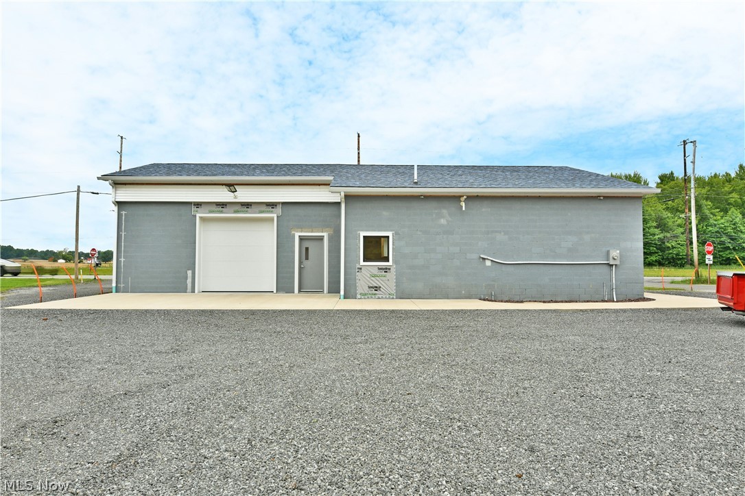 A shop space like no other! Whether you've been searching for a unique office layout, a personal or commercial showroom, or a turnkey property ready for your next venture, this incredible Southington opportunity checks every box and then some. Perfectly positioned along the highly traveled US-422 corridor, it offers outstanding visibility, excellent accessibility, and endless potential. A convenient side street entrance leads to a spacious gravel parking lot that wraps around the building, complete with a secondary drive for smooth traffic flow and easy exits. Completely updated from top to bottom within the last three years, this all-brick building delivers a fresh, modern feel inside and out. Attractive concrete work creates a sweeping sidewalk that leads to a generous pad at the main garage entrance, while new commercial-grade double glass doors welcome visitors inside past a service window to a receptionist's office. Gorgeous polished concrete floors shine beneath recessed lighting, creating a clean, professional atmosphere throughout. Just beyond, a second office provides the perfect space for a customer lounge, sales desks, or a comfortable waiting area, while a private manager's office completes the administrative layout. Across the hall, the mechanical room houses an on-demand hot water system that services the efficient heated floors. A common restroom and kitchen area adds everyday convenience. The true centerpiece of the property is the expansive rear showroom and storage space. Featuring tall ceilings, polished concrete floors, and an entire wall of windows that floods the space with natural light, this impressive area is as functional as it is eye-catching. An oversized 10' x 10' garage door makes loading and unloading effortless, while dual high-capacity overhead fans keep the space comfortable year-round. All the updates done in the last 3 years and the roof is ~4 years ago. Ask the listing agent for the list of all the updates completed!