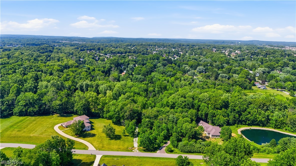 Rare opportunity to build your dream home on 6.211 acres in Copley! Located at 20 S Hometown Rd, this beautiful parcel offers privacy, space, and a thoughtful improvement already completed by the sellers. While the lot was originally designed with access from Hometown Rd, which would have required a bridge over the creek, the sellers completed the necessary work to secure an easement allowing driveway access from Spruce Run instead. This provides a more practical and desirable approach to the property while preserving the natural setting. With over six acres to work with, this property offers the perfect blend of wooded privacy, usable land, and flexibility for your future homesite. Bring your builder and vision to create the home and lifestyle you’ve been waiting for!