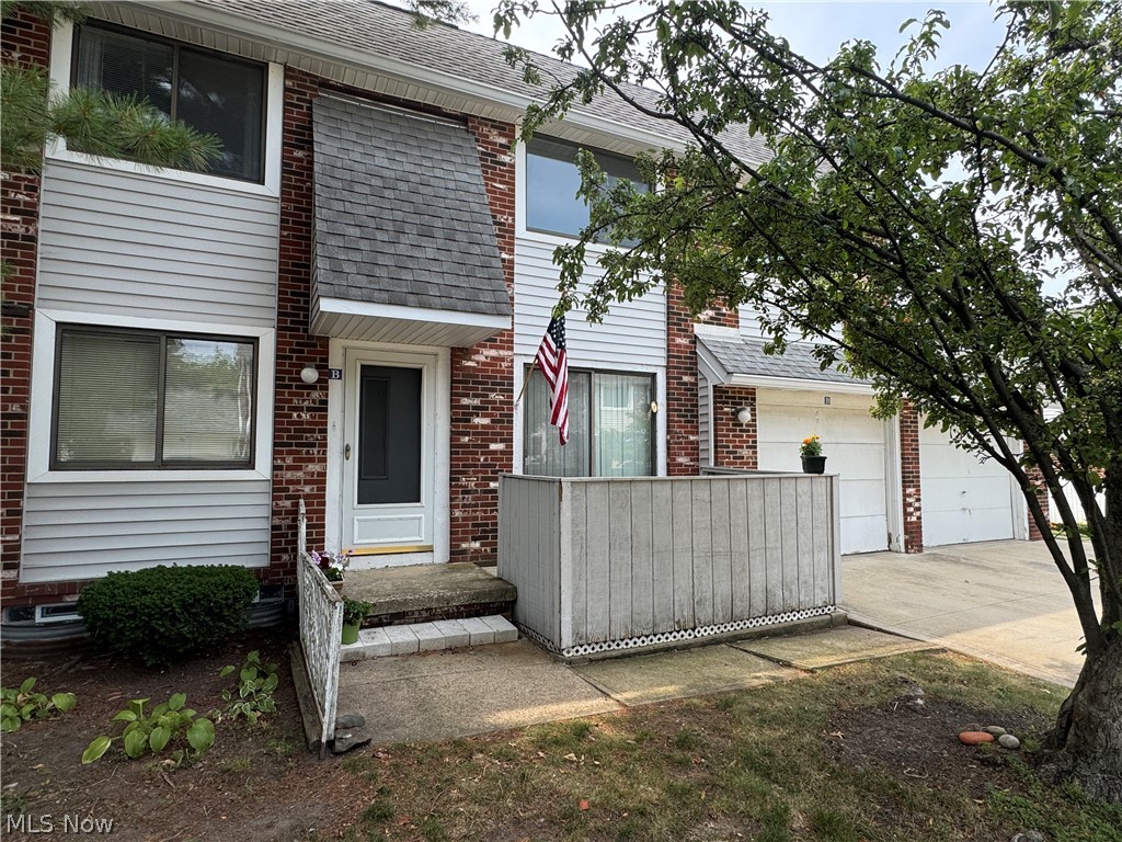 Welcome to this conveniently located, spacious 3-bedroom townhome, in the desirable Big Turtle II Condominium community in Willoughby! The inviting living room features newer laminate flooring that continues into the kitchen, creating a warm and cohesive living space. The large eat-in kitchen offers plenty of space with abundant cabinet and counter space, a generous dining area, and a sliding door leading to a private deck—perfect for relaxing or entertaining. All kitchen appliances are included. A full bath on the first floor adds convenience, while the attached garage provides direct access into the home through the kitchen. Upstairs, you'll find three generously sized bedrooms, each with ample closet space, along with a second full bath. The primary bedroom features a spacious dressing/vanity area and a walk-in closet. Newer carpeting throughout the second floor adds comfort and style. The finished, L-shaped recreation room in the basement provides valuable additional living space for a family room, home office, fitness area, or game room. A large utility/laundry room includes the washer and dryer and offers additional storage options. Residents of Big Turtle II enjoy outstanding community amenities, including a swimming pool, playground, and tennis courts. This community is located just minutes from freeway access, shopping, dining, parks, and other everyday amenities, this move-in ready townhome offers the perfect combination of space, comfort, and location. Schedule your appointment today.