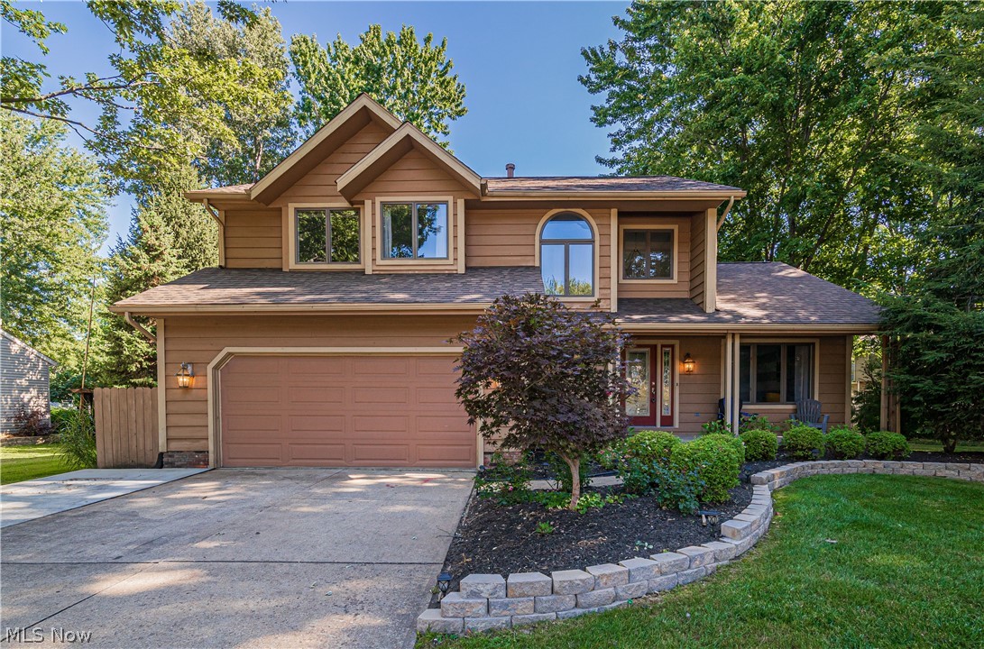 Beautifully maintained and landscaped Contemporary Colonial in the highly sought after Weatherby Park subdivision. Upon entering the home you will notice the 2 story foyer and beautiful hardwood flooring that extends to the vaulted Living room (with custom french doors) and Dining room as well as into the updated Kitchen and eating area. There are quartz countertops, newer backsplash and stainless steel appliances. The sunken family room has a gas fireplace for the chilly Ohio evenings. The second floor has 3 spacious bedrooms, all with ceiling fans. The owners suite has a walk in closet and private bath with double sinks, jetted tub and separate shower.  For summertime entertaining - there is a large deck and above ground pool! This home is perfect for entertaining. There is a first floor laundry area, full finished basement complete with an office. The lighting fixtures have also been updated, along with many rooms being freshly painted.  Nothing to do but move in and enjoy!