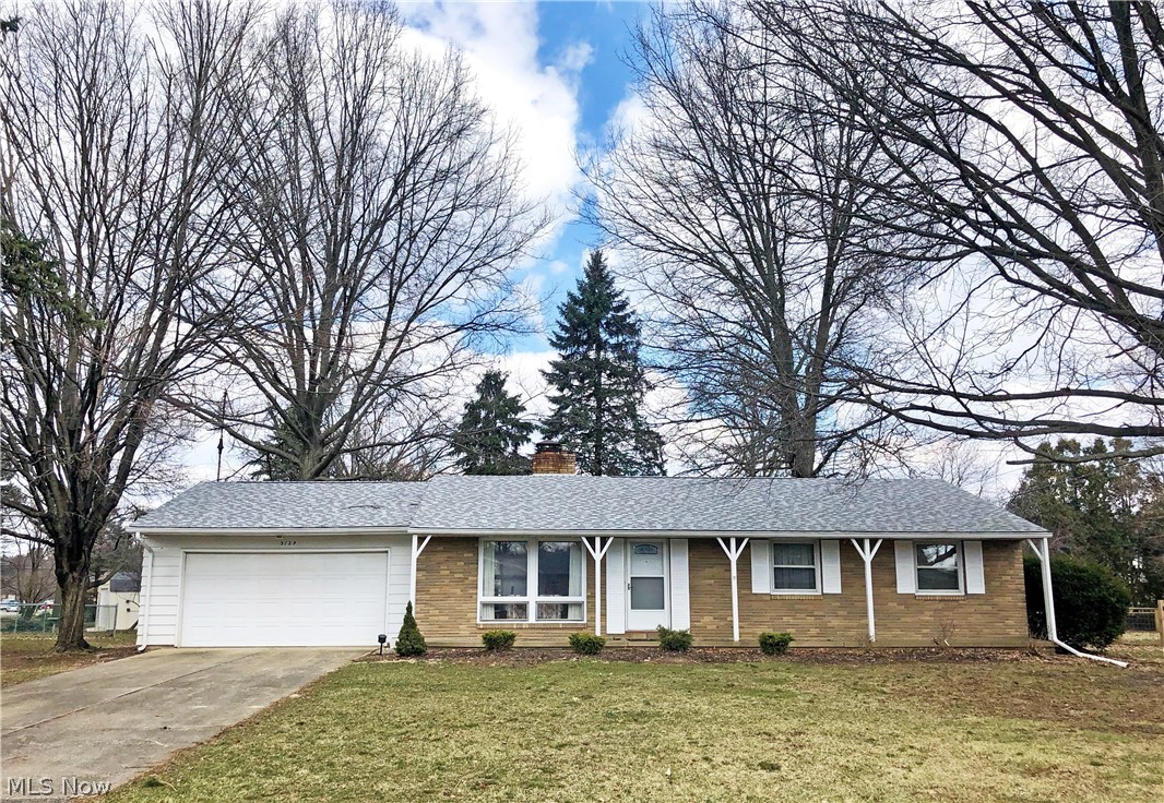 Incredible move-in ready ranch includes a large open great room with wood burning fireplace and vaulted ceilings that opens to the dining room, both with newly refinished hardwood floors. Kitchen with updated cabinetry, newer flooring, countertop range, and breakfast bar. Spacious master bedroom with dual closets and en suite bath. Both full baths have been completely remodeled with new flooring, vanities, and showers. New carpet and generous closet space in all bedrooms. This home features a sizable basement that could be easily finished, already including a bonus room/office, as well as a large 2-car garage. All this plus a gorgeous open backyard with mature trees, great for entertaining - don't miss this one!
