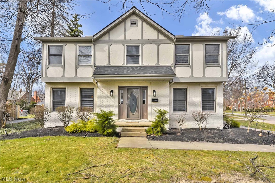 Prepare to be Moved!...into your “dream come true” University Hts. colonial, tastefully updated on a corner lot and sought after charming neighborhood. Over 3600 sqft of everything you could possibly imagine!  Gleaming wood floors throughout the first floor. Open-concept kitchen with SS appliances, tile backsplash & island/breakfast bar.  Adjacent family room with fireplace and sliding door access to the back patio, is bright & airy flooding the room with natural light. Convenient full bath & quiet office just steps off the kitchen. There is also a 5th bedroom on the main floor. Upstairs, the Owners master offers as en-suite with shower & dual-sink vanity. The second level also boasts three additional bedrooms and a 2nd full bath. The finished lower level is ideal for casual fun & includes a half bath as well as an additional space for a workout or craft room. Step outside onto the large back deck, perfect for dining & relaxing while enjoying the backyard. The 2-car garage is attached!