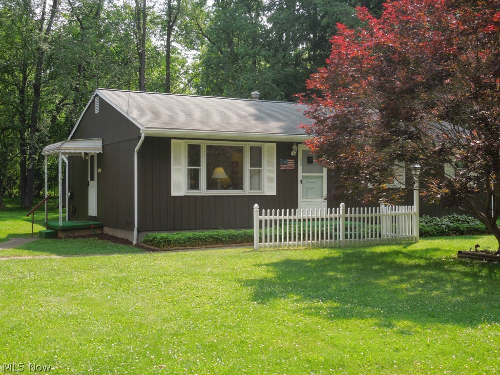 Looking for a home with a country feel but not too far from shopping, restaurants and city life?  Then this is the house for you!  Nestled on a quiet road is this three bedroom, one and a half bath ranch with almost a 1/2 acre of land to enjoy!  This home has been meticulously cared for inside and out--it is CLEAN, CLEAN, CLEAN and there's NO WALLPAPER!  All roofs were replaced in 2007, house, shed and garage. In 2002 the family room was built along with a half bathroom which adds over 350 square feet of living space. Concrete driveway was completed in 2008, front fencing and lamp post 2005. The basement is partially finished and also adds almost 400 square feet of additional space (not included in overall square footage), laundry area and workshop.  All appliances STAY with the property, even the washer and dryer!  Schedule your private showing today, this rare find won't last!!
