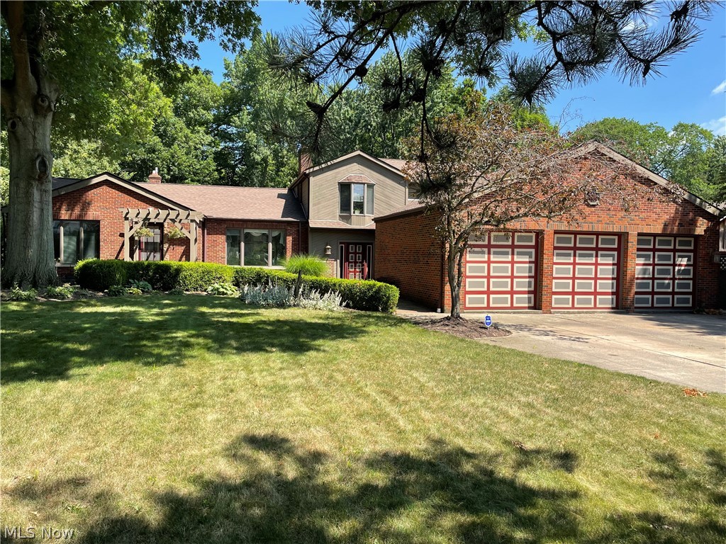 Take Advantage of This Rare Opportunity to Own an Expansive, Quality Built, Brick and Cedar Home on a Private, Wooded, Hf Acre Lot in Beautiful Rocky River. The Grounds are Paradise, a True Escape . Private and Strategically Designed for Outdoor Living w/ Covered Pergola, Patio, Tennis/Basketball Court (Great Spot For a Pool) and a Tranquil Rock Waterfall. Originally a Ranch, Owners added a Custom Built, 2 Story Addition (Early 2000) Creating a 4200 Sq Ft 4 Bdrm. (All Spacious) Home w/ 3 Full, 2 Hf Baths, 4 Fireplaces, Vaulted Ceilings and Spiral Staircases. Open Family Rm w/Access to a Open/Airy Great Rm Like Area w/Step Down Sun Rm. Huge Din. Rm. W/Tray Ceiling and Large Picture Window Adjoins Modern Kitchen w/White Cabinetry and Countertop Seating. 2 Spacious 1st Flr Bdrms. One Being a Former Mstr. Suite w/Full Ba. The 2nd Mstr. Suite is Enormous and is Located on the 2nd Flr w/Fireplace and Private Deck Overlooking the Park Like Yard. 2nd Floor also Features another Generous Sized