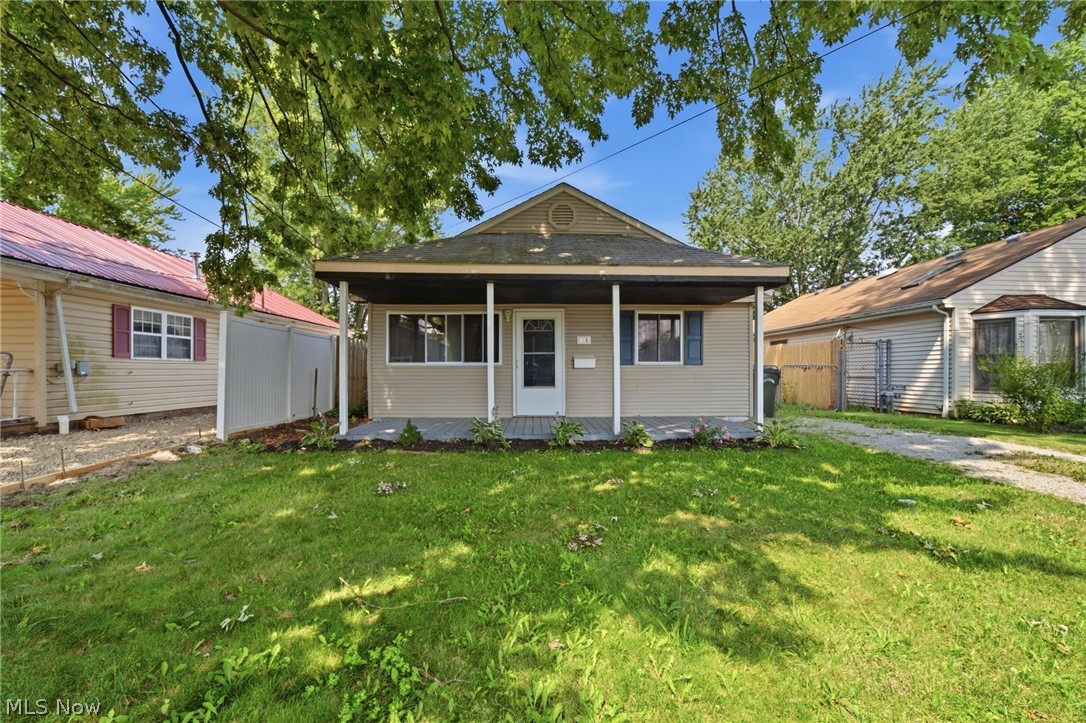 Beautifully maintained 3-bedroom, 1-bath ranch offering comfortable one-floor living, attractive flooring throughout, ceiling fans, and a bright, inviting layout. The spacious kitchen includes a range, microwave, and refrigerator, making this home truly move-in ready. Outside, you’ll fall in love with the large, level, fully fenced backyard featuring a privacy fence, children’s playset with an attached slide, and plenty of room for pets, play, gardening, and entertaining. Whether you’re hosting summer cookouts, watching the kids play, or relaxing after a long day, this backyard is designed to be enjoyed.

The welcoming front porch adds wonderful curb appeal and provides the perfect place to enjoy your morning coffee or unwind in the evening. Inside, the home has been lovingly maintained and offers a practical floor plan that’s easy to live in and easy to love. With three comfortable bedrooms, a full bath, and low-maintenance ranch living, this home is ideal for first-time buyers, downsizers, or anyone looking for a move-in-ready property.

Conveniently located and packed with features both inside and out, this charming home offers the space, comfort, and outdoor lifestyle today’s buyers are looking for. Schedule your private showing today!
