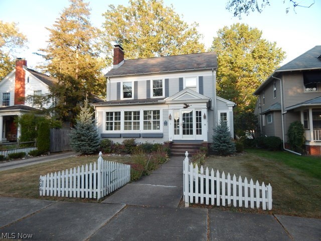 Don't make the mistake of just driving by this gem! Return to days gone by with this  charming 3 bedroom colonial. You will notice the attention to detail found in this home and old world charm missing in much of today's newer construction. Nice sized living room and separate family room too divided by french doors. Wonderful sunroom which is the perfect spot to relax and watch the seasons pass. Hardwood floors! Kitchen with ample cabinet and counter space. In the formal dining room with cute window seat, built ins and pocket doors-great trim and crown molding too! Three bedrooms located on the second floor. You won't want to miss the fabulous master bedroom with built ins and cozy fireplace too! Lots of closet space. Full unfinished basement with workshop area awaits your finishing plans and ideas. Great backyard with two car detached garage. New roof-front portion replaced Aug 2018 and so much more! Call today to schedule a private tour!
