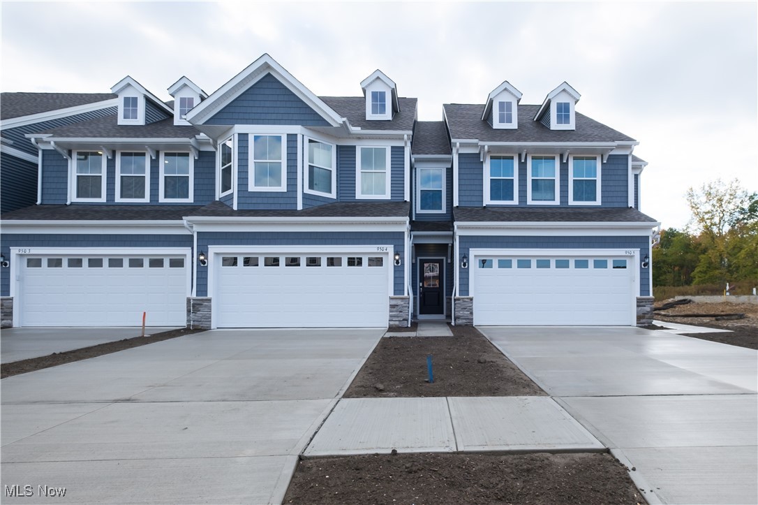 Tucked in one of the community’s most private, wooded homesites, this LAST quick move in Ashton townhome offers a rare blend of seclusion, style, and truly turnkey living. Thoughtfully designed for a busy lifestyle, the open main level features 9' ceilings and upgraded LVT flooring, setting the stage for a home that feels both polished and welcoming. The chef’s kitchen stands out with its granite countertops, 42" white maple cabinetry, SS Whirlpool appliances—and effortless flows into the bright gathering room. A cozy fireplace anchors the space, while the sliding glass door at the café opens to a private patio framed by mature trees—your own peaceful retreat for grilling, morning coffee, or evenings around a fire. Upstairs, the owner’s suite feels like a true getaway with its large walk-in closet, and spa inspired bath featuring a quartz double vanity and frameless glass shower. A charming surprise awaits in the secondary bedroom: a set of exclusive bay windows found only in this elevation, filling the room with natural light and character. The private walk in closet and direct access to the full bath is ideal for guests. The third bedroom offers flexibility for a home office, nursery, gym, or creative space, and the upstairs laundry with included front load washer and dryer adds everyday convenience. This home is fully outfitted with thoughtful upgrades—window blinds, a whole home smart package, video doorbell, and Wi Fi–ready appliances—so you can move in without lifting a finger. Paired with the ease of a limited maintenance community, Renaissance Park continues to be one of Aurora’s most desirable places to call home. Now is the right moment to secure this brand-new townhome on a rare, wooded lot.