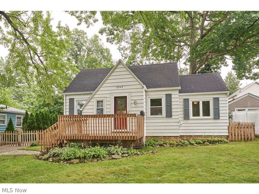 Directly across from the 4 acres of Oak Park, this cute cape has been updated throughout. From the newly finished upstairs to the extensive water mitigation in the basement, you will find quality work. All of the wiring has been upgraded to 3 wire romex, the drains have been cleared, the chimney rebuilt and reflashed, rooms have been insulated, and the entire sunporch rebuilt. Downstairs you will find a good sized living room, open kitchen and a dining room with new large front and back windows. Also, there are 2 bedrooms and a full bath with tub. Upstairs there's a newly insulated and finished bedroom, and plumbing for a half bath to finish for your needs. The basement is partially finished with a large family space and another full bath with shower. There's a large laundry area, work bench and a storage area. The back sun porch has been totally rebuilt with new walls, roof and windows. The back yard is completely fenced in and there's a one car garage. All this comes with a one year