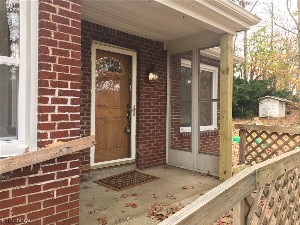 Its all been done. Move on in to this 2 bedroom Ranch, featuring hardwood floors, freshly painted interior walls, new vinyl windows. 
The septic has been replaced, a new Buckeye Water service has been installed.