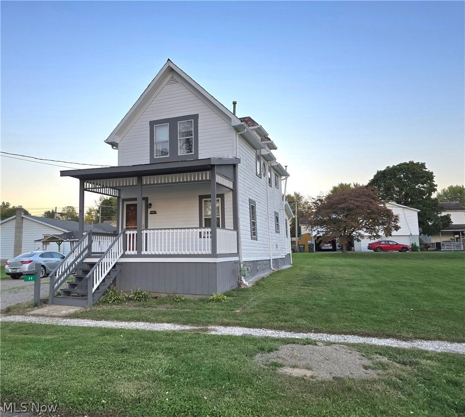 Great Convenient Neighborhood  Maysville Schools Double Lot, Covered Front Porch ( 18' x 16' ) Plus Covered Side Porch ( 16' x 8' ) Large Eat-In Kitchen, Main Floor Laundry Room or Office due to the Additional Outside Entry, ( Room Could also be converted to a Main Floor Bedroom ) Full Basement with Inside And outside Access, ( inside Stairway Plus Outside Covered Entry ) Original hardwood Floors, Newer 1 Car Garage with Electric and Automatic Garage Door Opener, 2 Large Bedrooms and the updated full Bath on the Second Floor, Unique  Round Window Sets Off the Upstairs Hall at the Top of the Stairway, There are the Original Hardwood Floors under the Linoleum in The Bedroom, This is a Well Maintained Family Home Built in The Row House Style for Family's that Worked in the Near By Factories